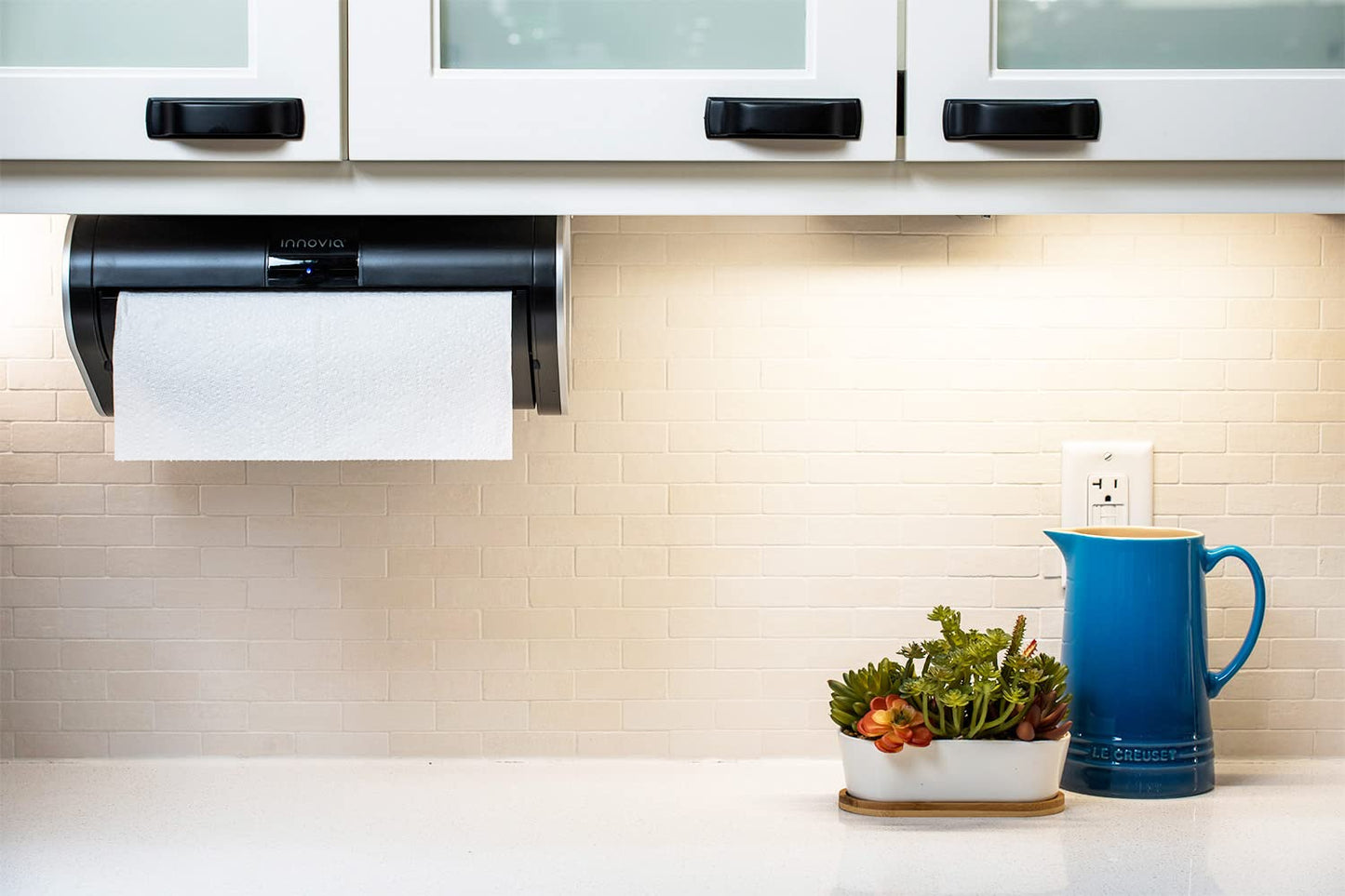 Innovia Automatic Paper Towel Dispenser. Touchless Technology. Works with Most Paper Towel Brands and Sizes. Dispenses The Number of Sheets You Need. Black, Under Cabinet Mounted.