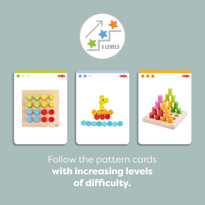 HABA Rainbow Risers Wooden Stacking Game: Montessori Toys for 2 Year Old & Up, Shape Sorter & Wooden Pegboard Preschool Learning Toys with Challenge Cards