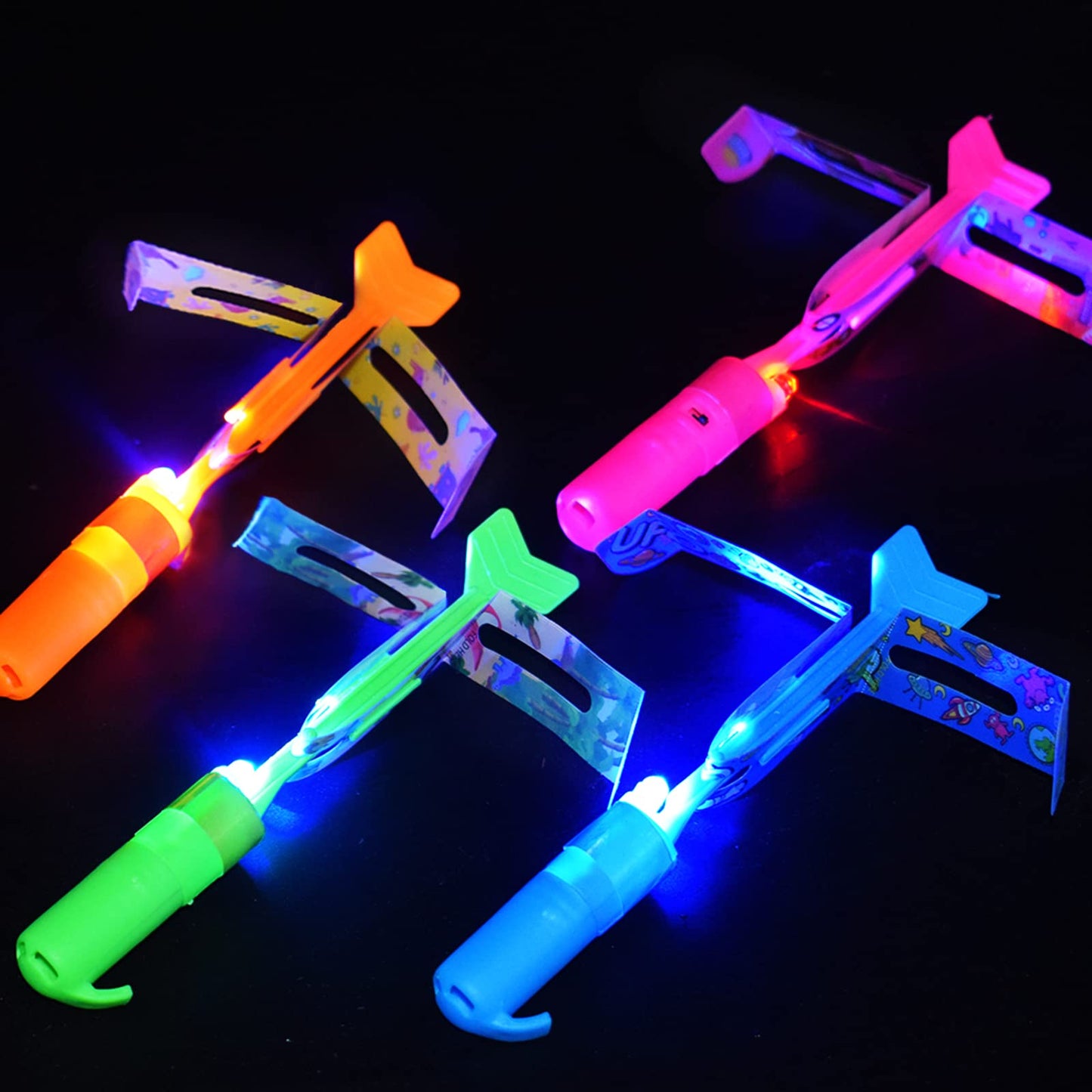 JX Rocket Slingshot Flying Toys with Led Lights,12Pcs LED Arrow Helicopters + 12Pcs Launchers,Summer Outdoor Game LED Slingshot Toy for Kids, Glow in The Dark Kids Party Supplies