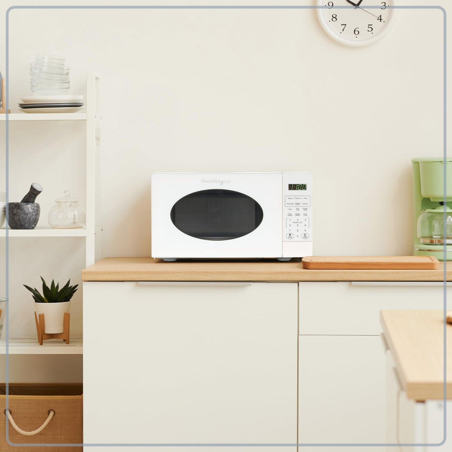 Nostalgia Modern Retro Countertop Microwave Oven - 700-Watt - 0.7 cu ft - 12 Pre-Programmed Cooking Settings - Digital Clock - Kitchen Appliances - White