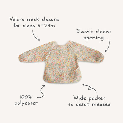 mushie Long Sleeve Baby Bib | Water Resistant Adjustable Fit for Ages 6-24 Months (Pastel Blooms)