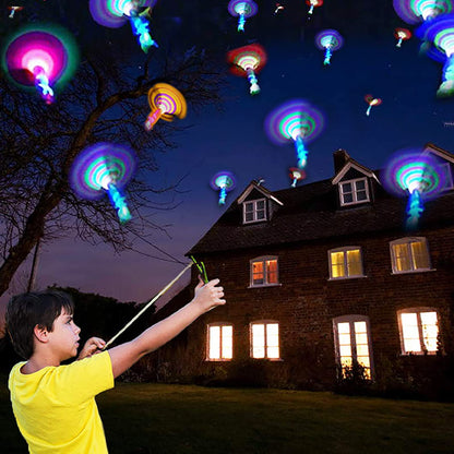 JX Rocket Slingshot Flying Toys with Led Lights,12Pcs LED Arrow Helicopters + 12Pcs Launchers,Summer Outdoor Game LED Slingshot Toy for Kids, Glow in The Dark Kids Party Supplies