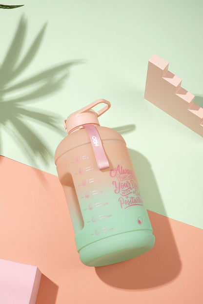 H2O Capsule INSPO Gallon Water Bottle with Time Marker and Straw Motivational Hydration Tracker Jug Big BPA-Free Food-Safe Leakproof Drinking Bottle with Handle & Strap, Lotus Blossom