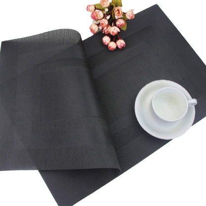 PIGCHCY Placemats,Washable Vinyl Woven Table Mats,Elegant Durable Placemats for Dining Table Set of 4 (18 x 12 inches, Pure Black)