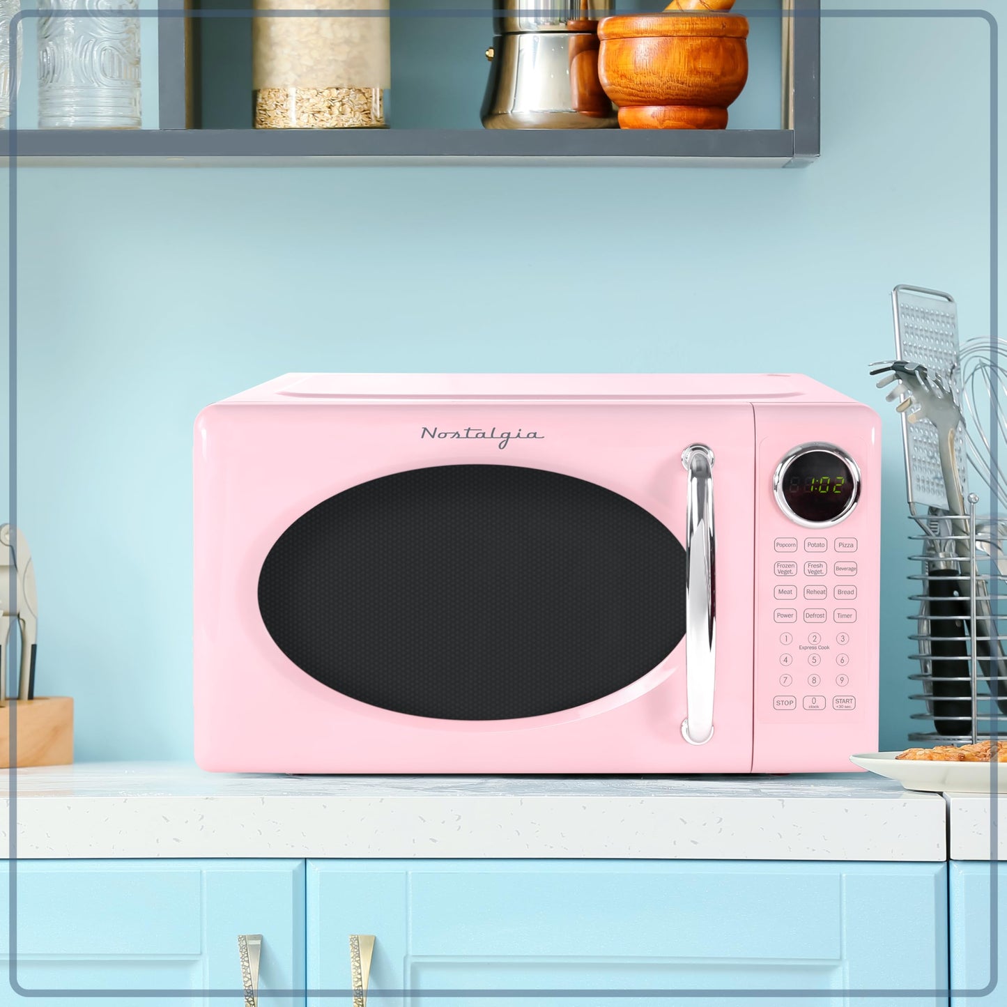Nostalgia Retro Microwave Oven 0.7 Cu Ft, 700-Watt Countertop Size with Glass Turntable, Child Safety Lock, 8 Auto-Cook Programs, Digital Clock, Pink
