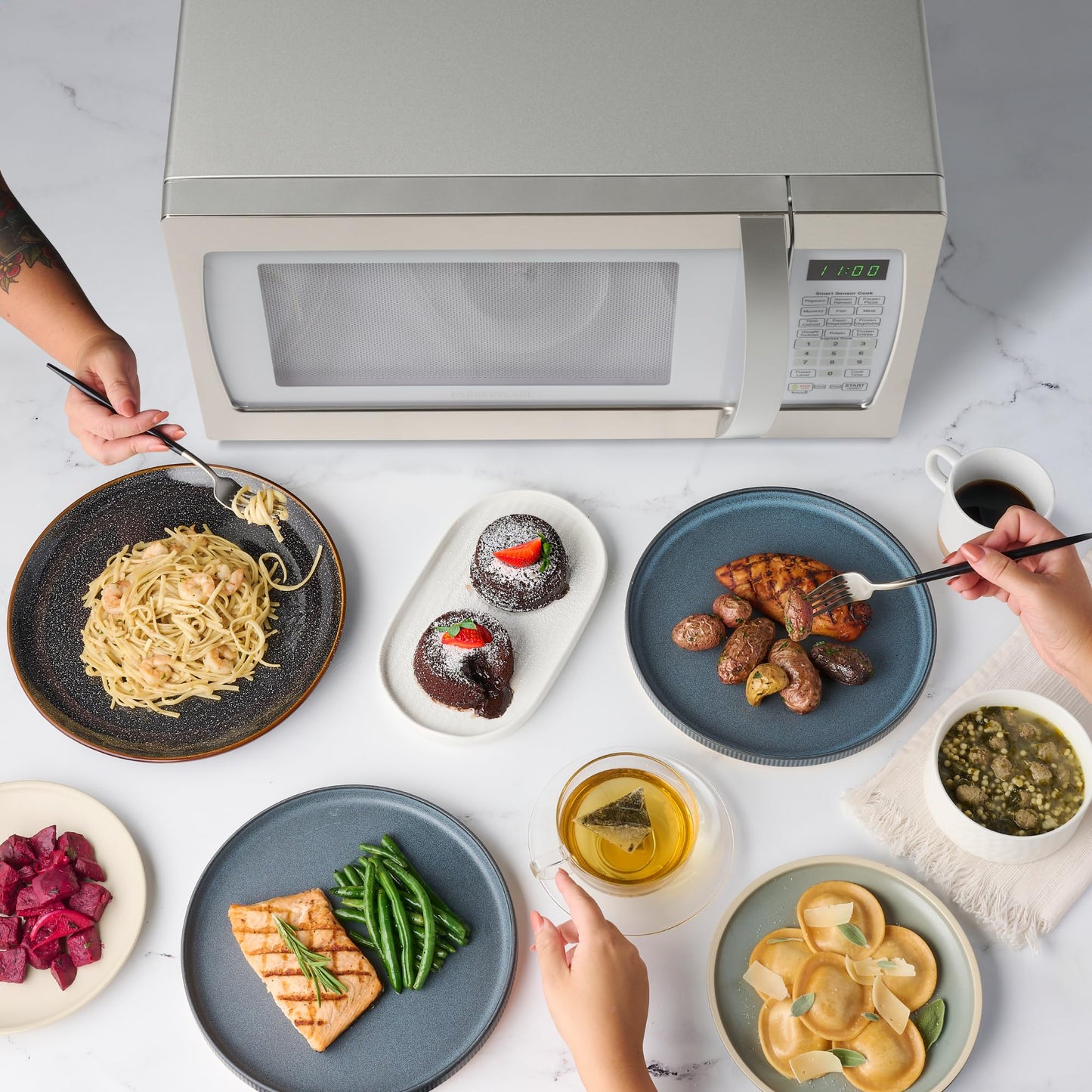 Farberware Countertop Microwave 1100 Watts, 1.3 cu ft - Smart Sensor Microwave Oven With LED Lighting and Child Lock - Perfect for Apartments and Dorms - Easy Clean Retro White, Platinum