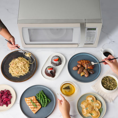 Farberware Countertop Microwave 1100 Watts, 1.3 cu ft - Smart Sensor Microwave Oven With LED Lighting and Child Lock - Perfect for Apartments and Dorms - Easy Clean Retro White, Platinum