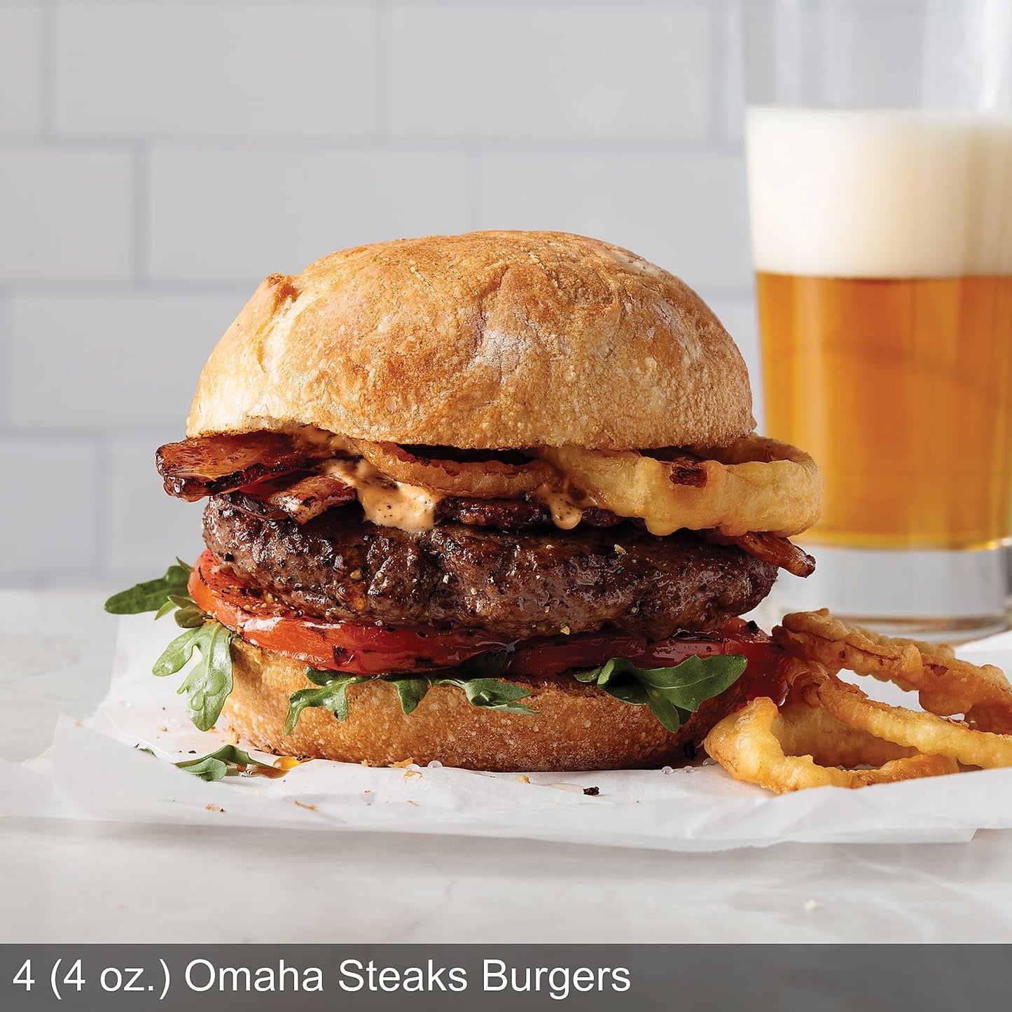 Omaha Steaks Deluxe Gift Package (4 Bacon-Wrapped Filet Mignons, 4 Steak Burgers, 4 Gourmet Jumbo Franks, 4 Potatoes au Gratin, 4 Caramel Apple Tartlets, 1 jar Omaha Steaks Seasoning)