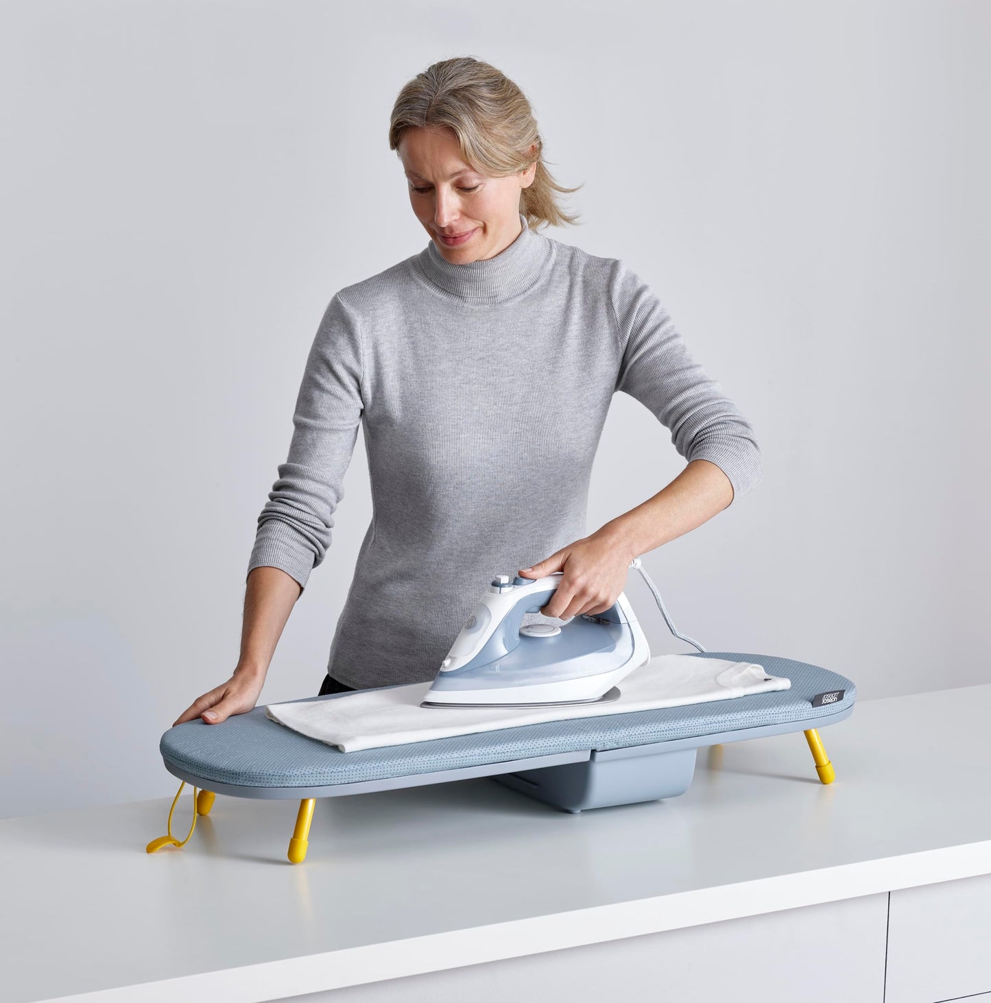 Joseph Joseph Pocket Folding Tabletop Ironing Board with Iron Holder and wall mount, Compact Space-Saving , Grey/Yellow