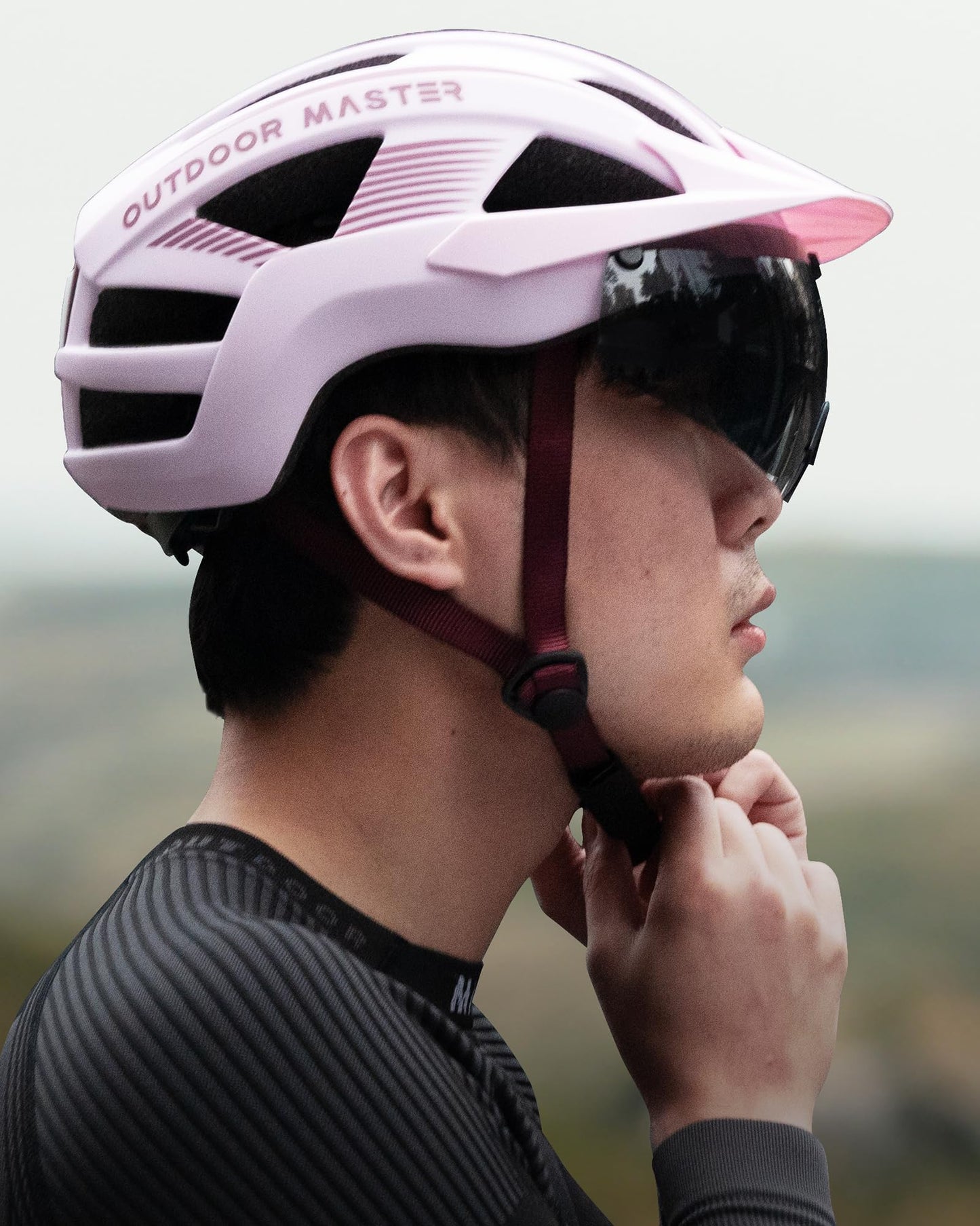 OutdoorMaster Helmets for Adults - Mountain & Road Bike Helmet with Rechargeable Safety Light, Detachable Goggles and Sun Visor - Easy to Adjust, Breathable, Lightweight - Large