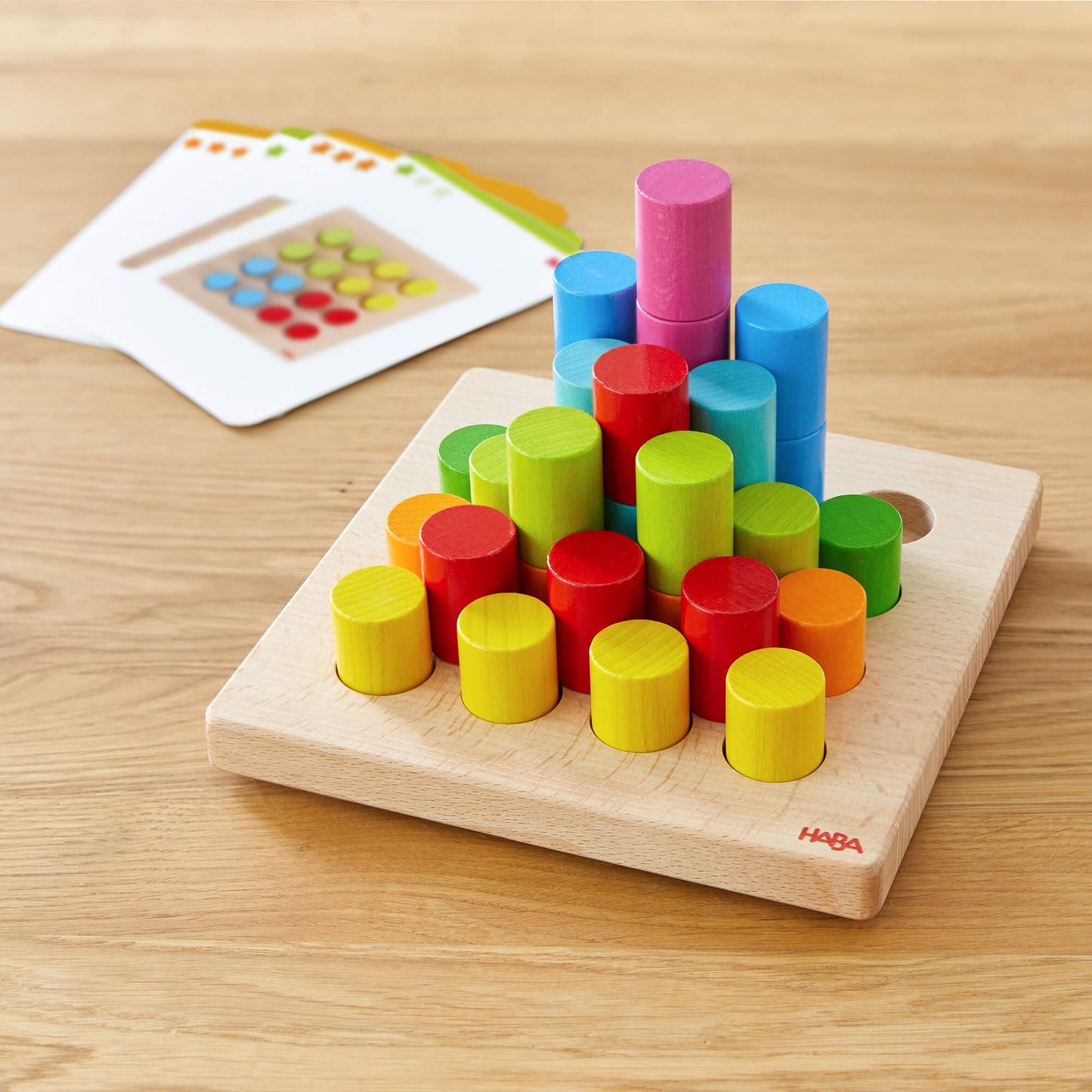 HABA Rainbow Risers Wooden Stacking Game: Montessori Toys for 2 Year Old & Up, Shape Sorter & Wooden Pegboard Preschool Learning Toys with Challenge Cards