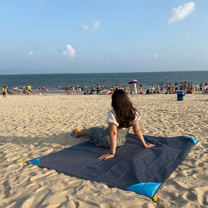 HZJOYUE Outdoor Picnic Blanket (71" x 55") -Compact, Lightweight, Sand Proof Pocket Blanket for The Beach, Hiking, Travel, Camping, Festivals with Pockets, Loops, Stakes, Carabiner (Blue)