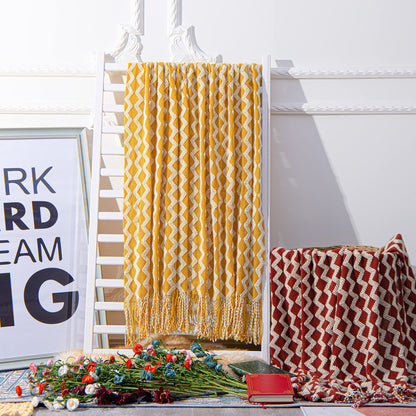 NTBAY Acrylic Knitted Throw Blanket, Lightweight and Soft Cozy Decorative Woven Blanket with Tassels for Travel, Couch, Bed, Sofa, 51x67 Inches, Mustard Yellow Wave