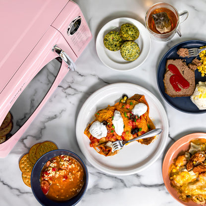 Nostalgia Retro Microwave Oven 0.7 Cu Ft, 700-Watt Countertop Size with Glass Turntable, Child Safety Lock, 8 Auto-Cook Programs, Digital Clock, Pink