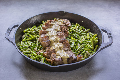 Lodge 12 Inch Pre-Seasoned Cast Iron Skillet - Dual Assist Handles - Use in the Oven, on the Stove, on the Grill, or Over a Campfire - Black