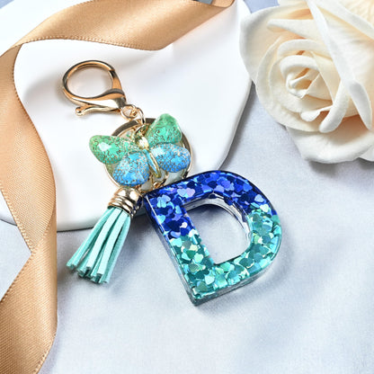 JINGUAZI Initial letter Keychains for Women Tassel Butterfly Pink Purple Cute Car Keychain for Wallet Backpack bag charm (D-Blue Green)