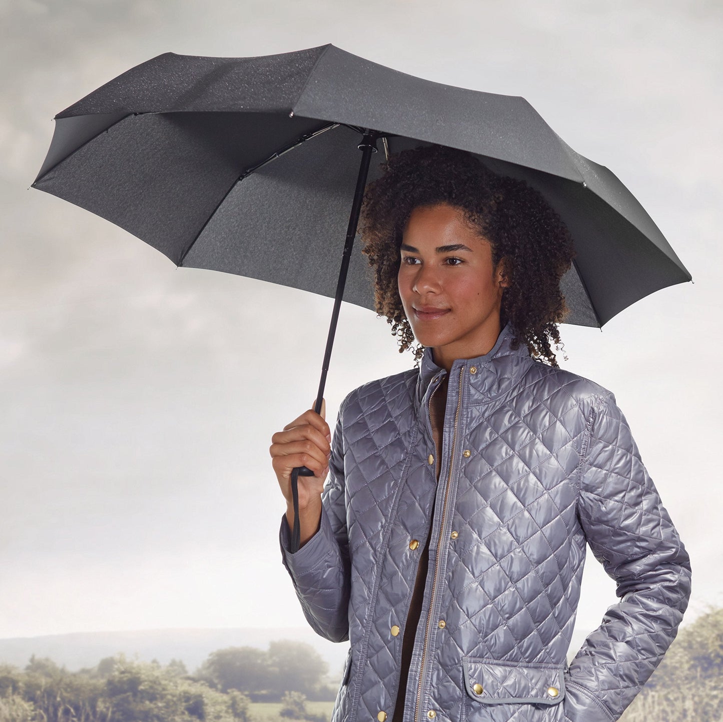 Amazon Basics Round Travel Umbrella for Rain, Compact Umbrella with Auto Open/Close, Strong Alloy Steel Frame, Compact Size for Backpacks/Handbags (11" Long When Closed), One Size, Black